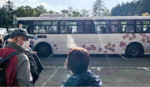 Take a numbered ticket and get on the bus